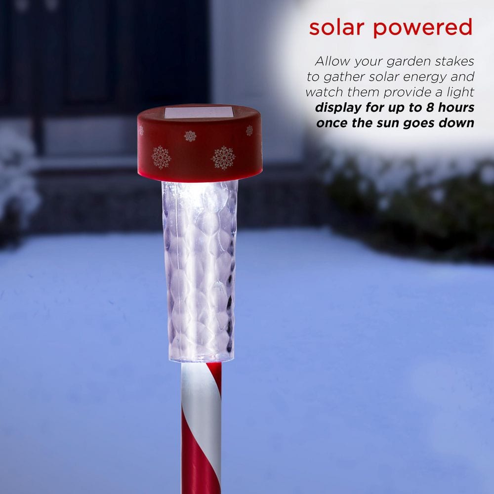 Alpine Corporation 27" Striped Plastic Solar Light-Up Holiday Garden Stakes, Set of 4, Red/White