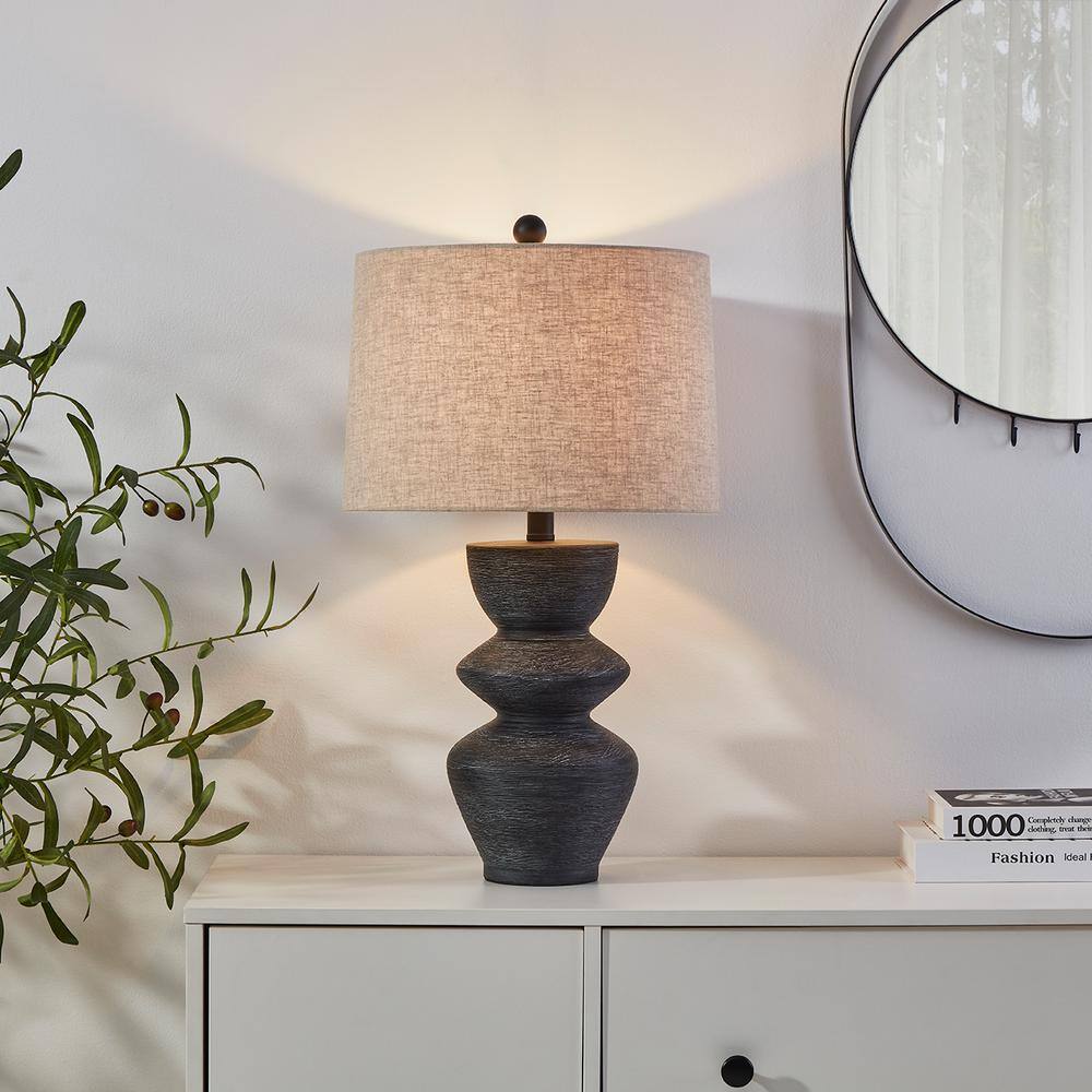Kawoti 25" Black Distressed Ceramic Table Lamp with Beige Shade
