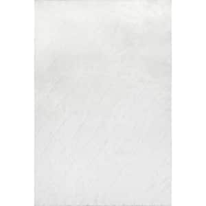 Amy Machine Washable White 4 ft. x 6 ft. Solid Area Rug