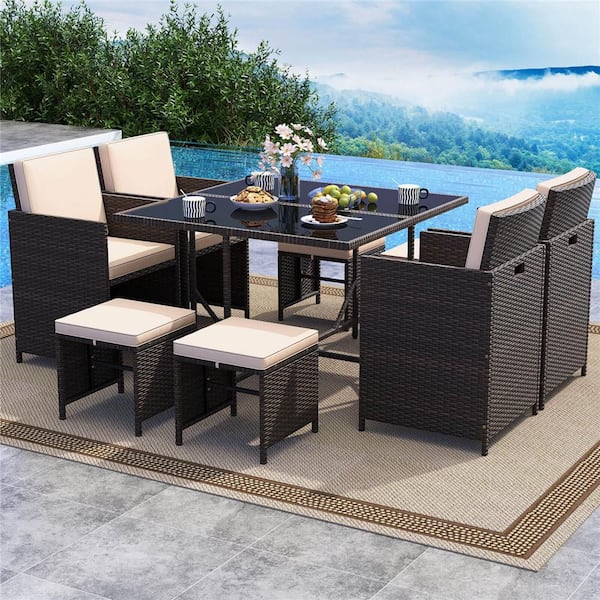 9-Piece Wicker Outdoor Dining Set with Tempered Glass Table and Ottoman Beige Removable Cushions