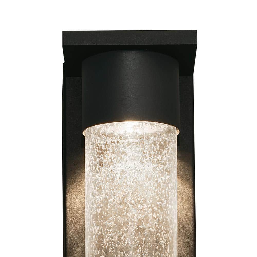 Dimmable Black Metal Cylinder Sconce with Seeded Glass Shade
