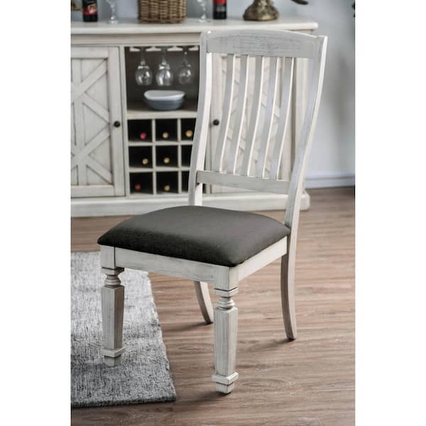 https://images.thdstatic.com/productImages/59235124-334e-4578-9be1-75397cb9aefc/svn/antique-white-furniture-of-america-dining-chairs-idf-3089sc-c3_600.jpg