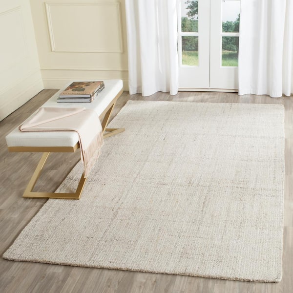 Abstract Ivory/Beige 6 ft. x 9 ft. Solid Area Rug