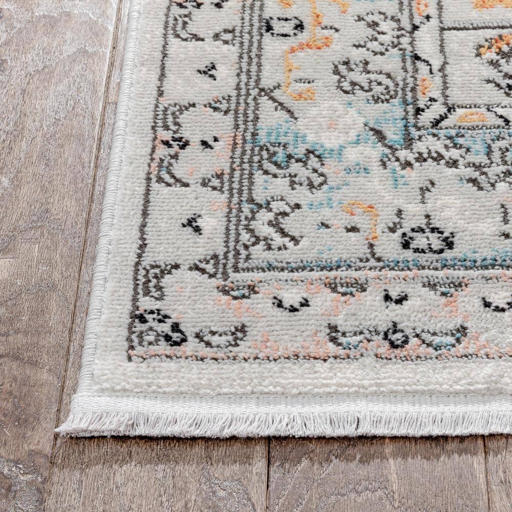 Indira Blue and Ivory Rectangular Synthetic Area Rug 4' x 6'