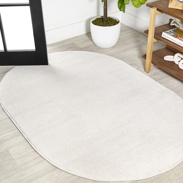 JONATHAN Y Haze Solid Low-Pile Cream 4 ft. x 6 ft. Oval Area Rug