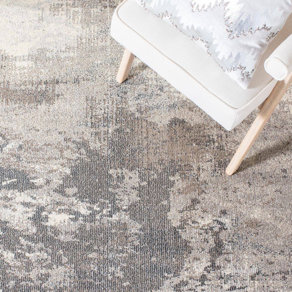 Beige and Grey Abstract 3' x 5' Synthetic Area Rug