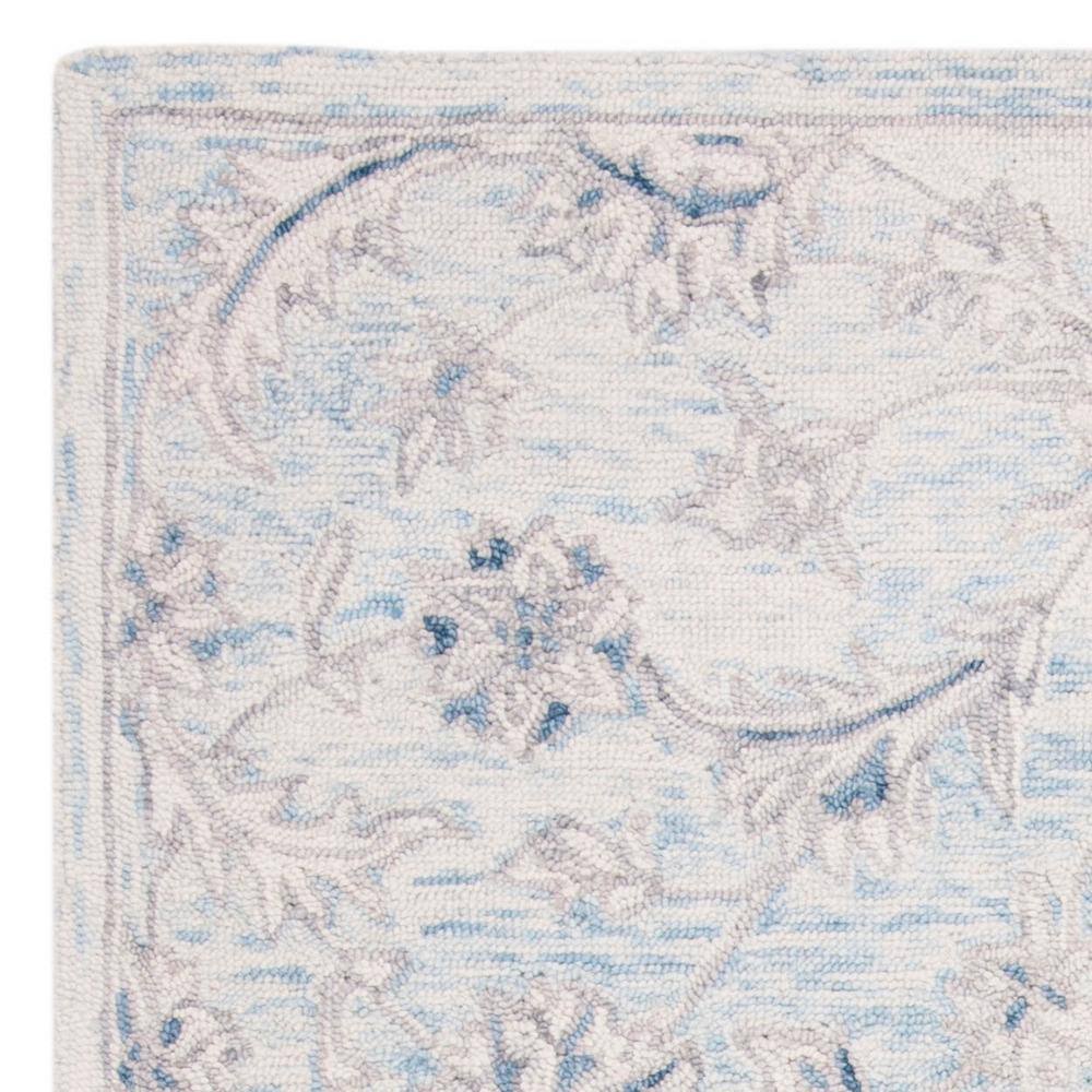 Light Blue Ivory Hand-Tufted Wool 4' x 6' Area Rug