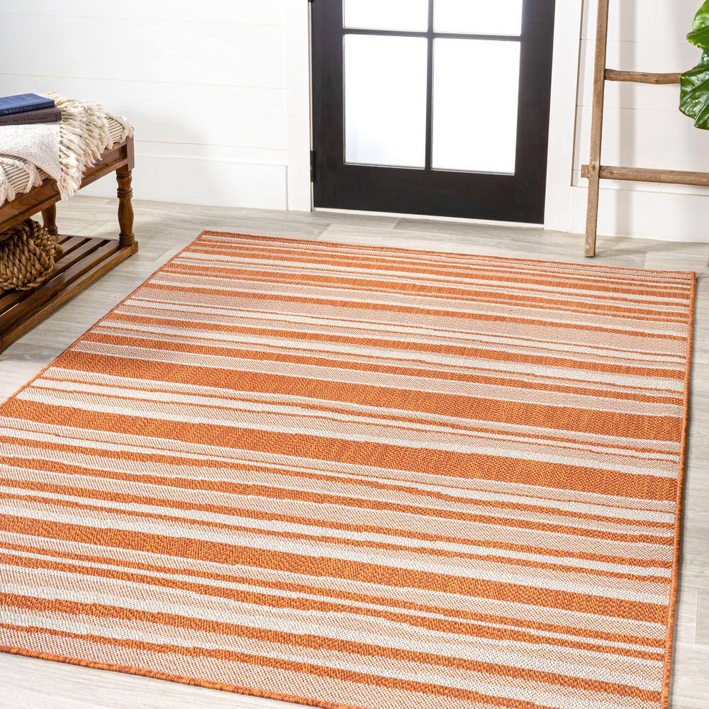 Castara Chic Orange & Cream Striped Synthetic 5x8 Area Rug