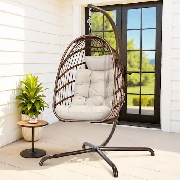 Foldable 350 lbs. 1-Person Brown Wicker Patio Swing Egg Chair with Gold Stand and Beige Cushion, Outdoor Hanging Chair