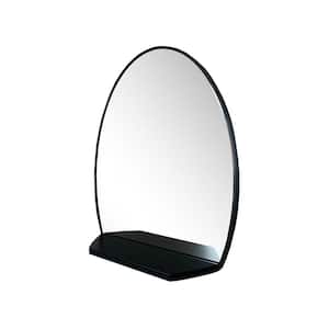 24 in. W x 28 in. H Framed Oval Metal Wall Bathroom Vanity Mirror with Shelf in Matte Black