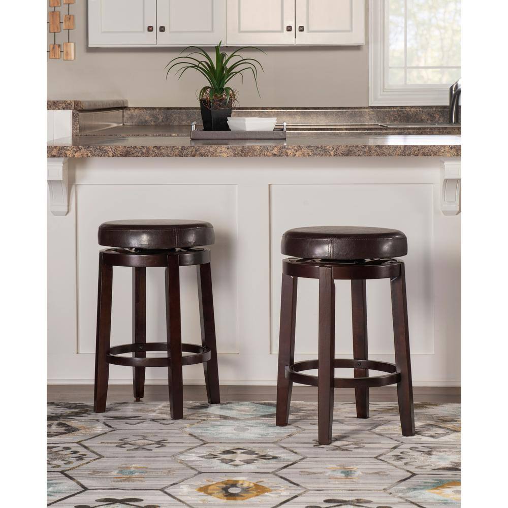 Elegant Maya 24" Brown Swivel Backless Wooden Counter Stool