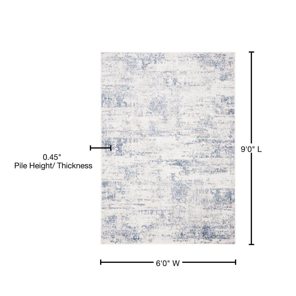 Ivory & Blue Abstract Synthetic 6' x 9' Reversible Area Rug