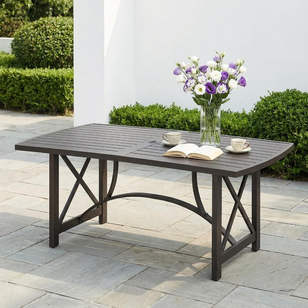 Outdoor dining table with slatted top and matching frame on patio