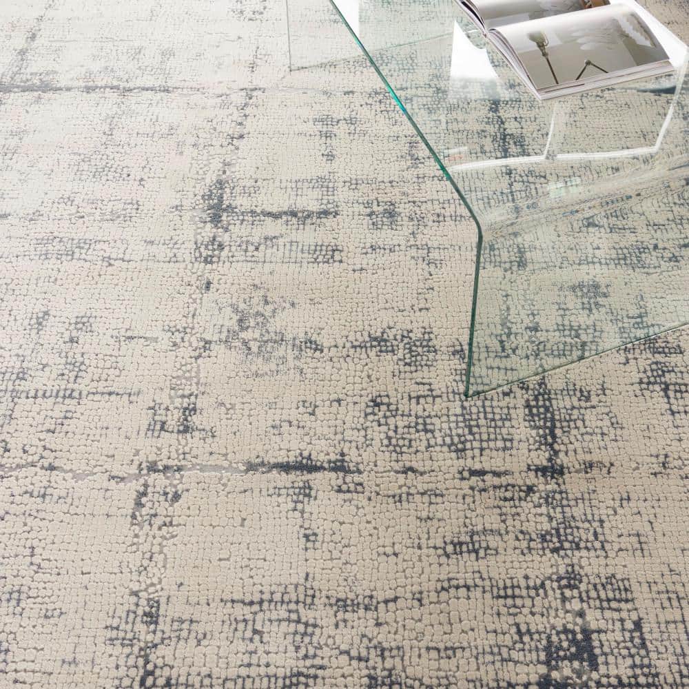 Modern Abstract Ivory & Blue Synthetic Area Rug 7'10" x 10'6"