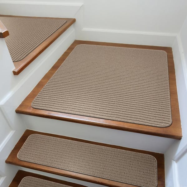 https://images.thdstatic.com/productImages/59bb5770-5289-43ac-8169-ac16749197d3/svn/beige-beverly-rug-stair-tread-covers-hd-trd10944-3x3-c3_600.jpg