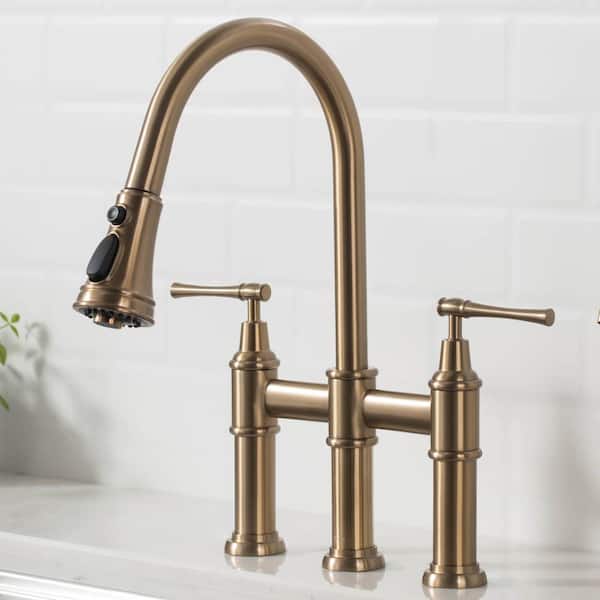 Photo 1 of Allyn Transitional 2-Handle Bridge Kitchen Faucet with Pull-Down Sprayhead in Brushed Gold