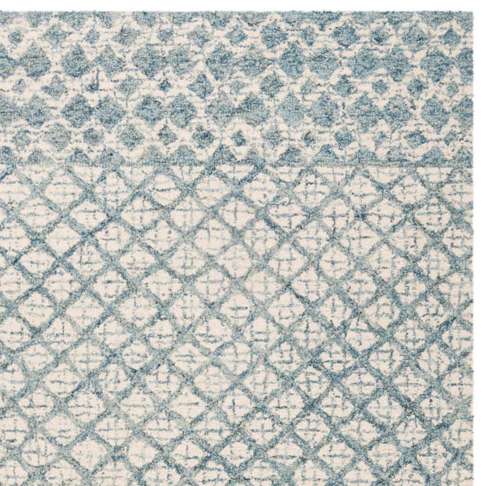 Blue and Ivory Tufted Wool 8' x 10' Area Rug