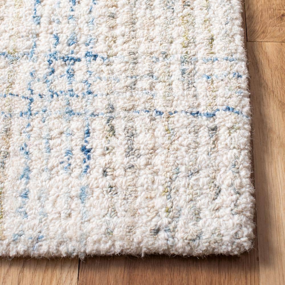 Ivory and Beige Abstract Handmade Wool Area Rug, 6' x 9'
