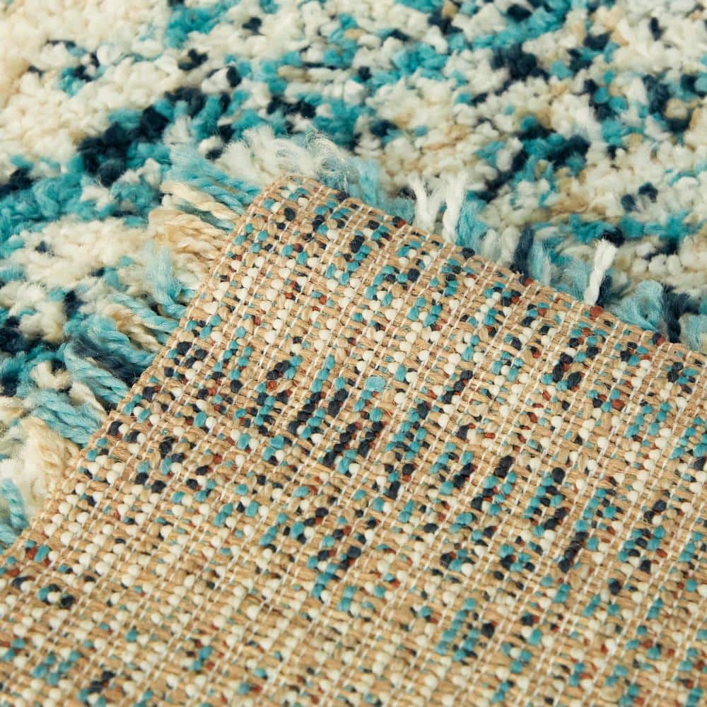 Teal and Beige Abstract Shag 5' x 7' Area Rug