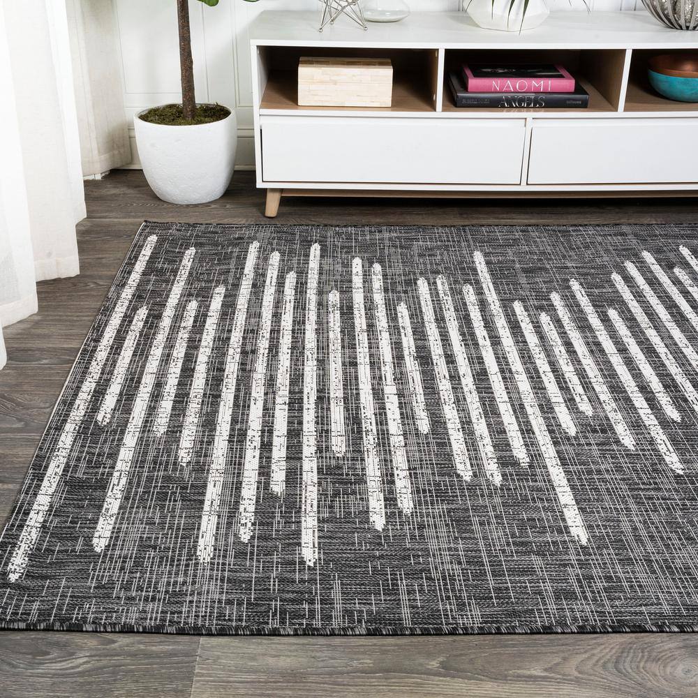 Zolak 4' x 6' Black and Ivory Synthetic Stripe Rug