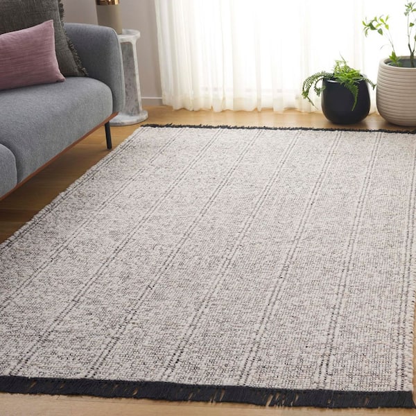 Manhattan 9 ft. x 12 ft. Ivory/Black Solid Color Distressed Area Rug