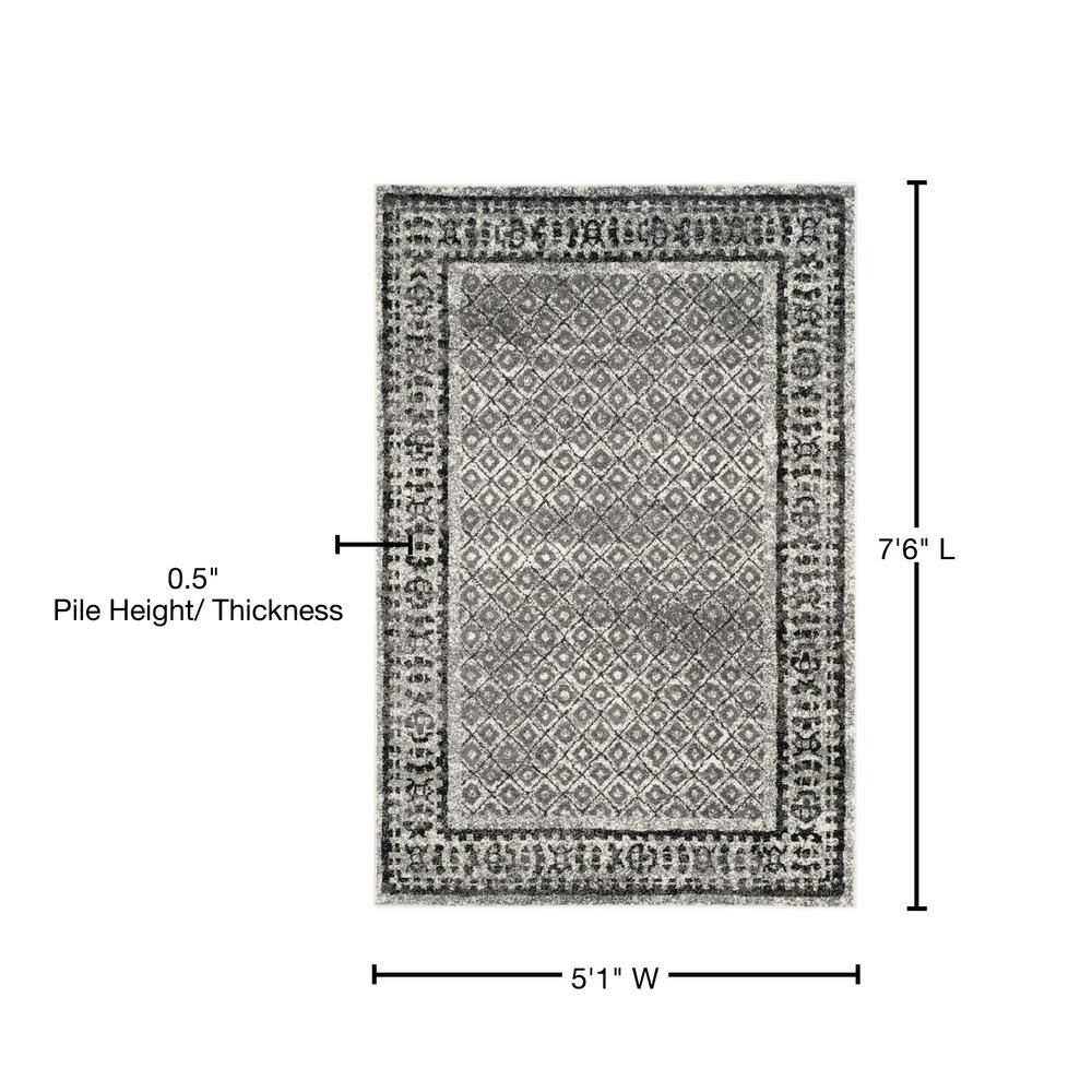 Ivory and Silver Rectangular Synthetic Area Rug