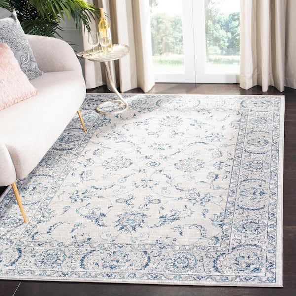 Brentwood Light Gray/Blue 9 ft. x 12 ft. Speckled Floral Border Area Rug