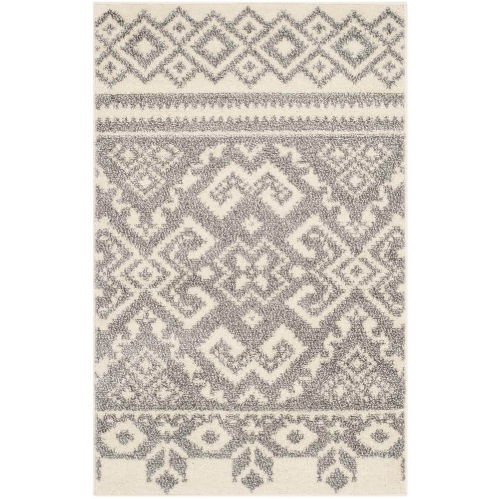 Chic Ivory & Silver Hand-Knotted Synthetic Area Rug - 2'6" x 4'