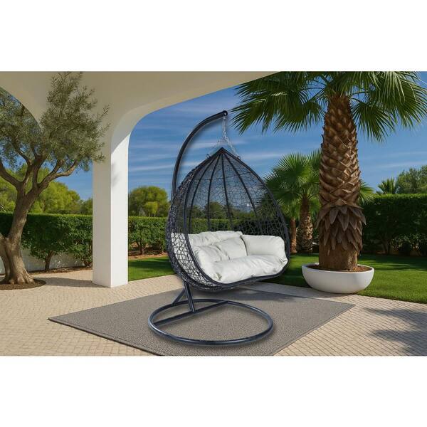 Hanging Metal Porch Swing Chair in Black Stainless Steel Frame with Cushions Recluse Collection in Beige