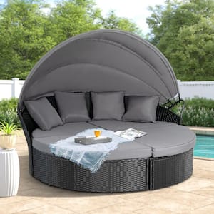 4-Piece Wicker Outdoor Day Bed with Black Cushions and Retractable Canopy