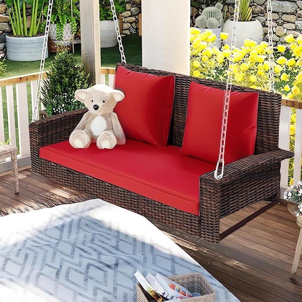 Cesicia Patio Outdoor 50 in. W 2-Person Hanging Wicker Porch Swing with Chains and Red Cushion Pillow