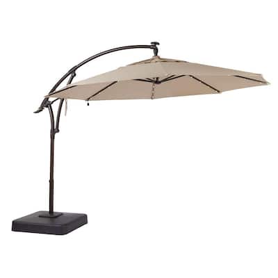 11 ft. LED Round Offset Outdoor Patio Umbrella in Sunbrella Sand