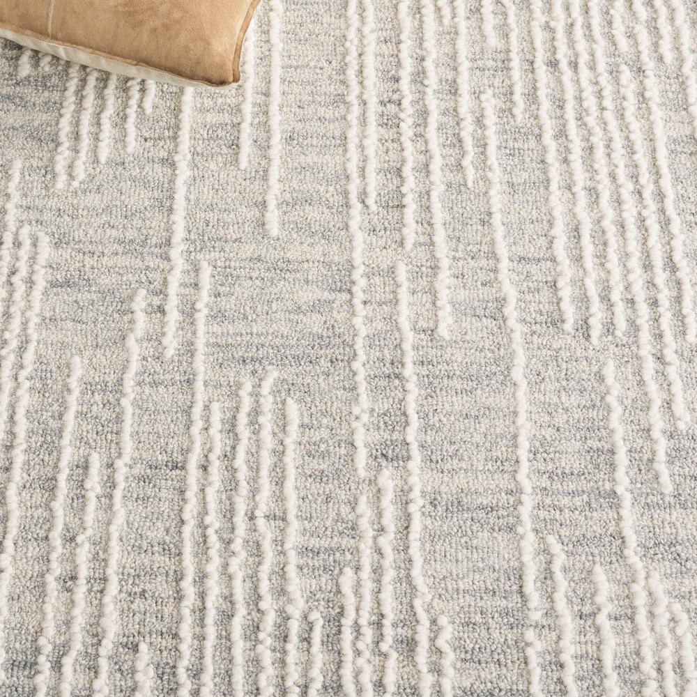 Handmade Light Grey and Ivory Wool Tufted Medium Rectangle Rug