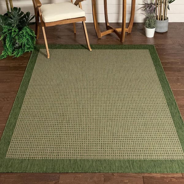 https://images.thdstatic.com/productImages/5abdb96b-c88b-4099-a6e9-39edcc179014/svn/green-well-woven-outdoor-rugs-med-35-5-c3_600.jpg