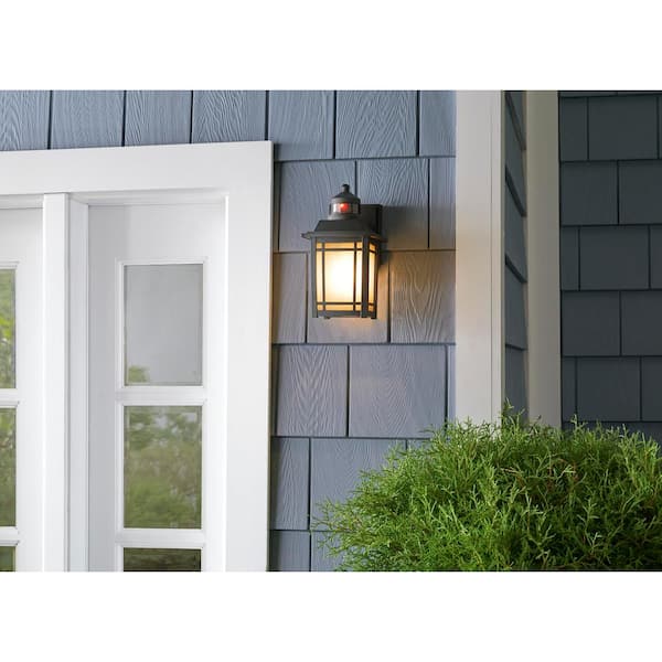 Port Oxford 10.6 in. 1-Light Oil Rubbed Chestnut Motion Sensing Hardwired Outdoor Wall Light Lantern Sconce