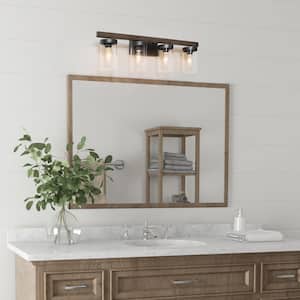 Farmhouse Brushed Black Bath Vanity Light, 28 in. 4-Light Faux Wood Grain Wall Sconce with Cylinder Clear Glass Shades