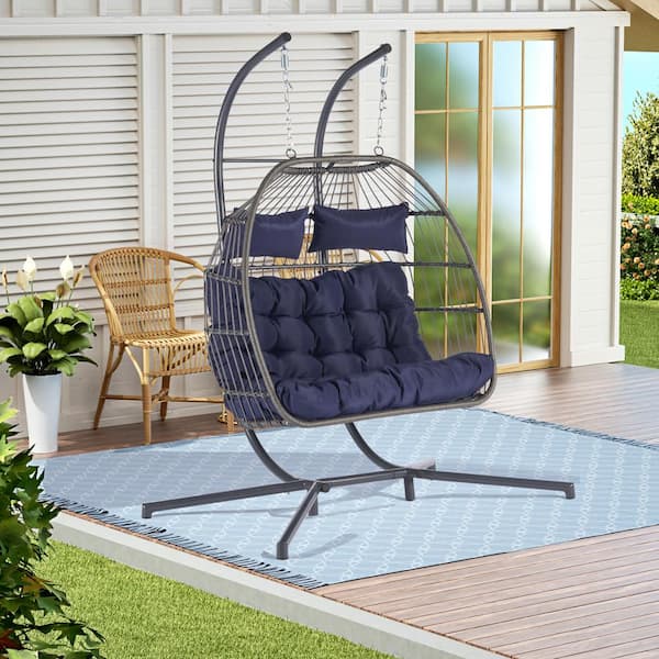 Runesay 2 Person 720 lbs. Outdoor Rattan Hanging Metal Patio Chair Wicker Egg Chair with Black Stand and Dark Blue Cushions