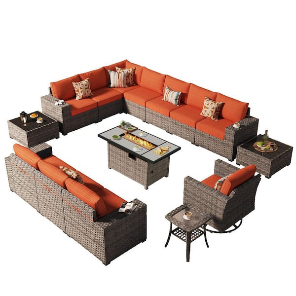 Meraki 15 Pieces Wicker Outdoor Patio Rectangular Fire Pit Set and Swivel Rocking Chairs with Orange Red Cushions