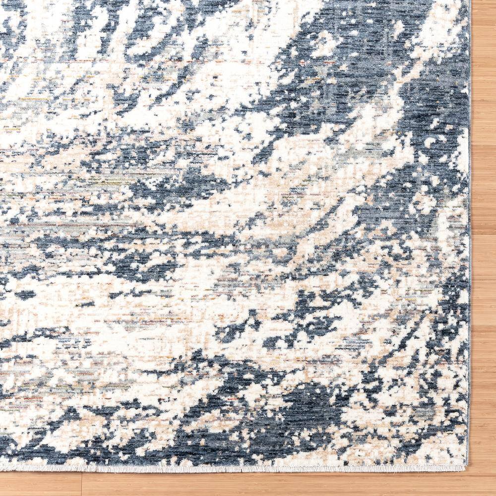 Damita Exton Blue and Beige 6' x 9' Abstract Area Rug