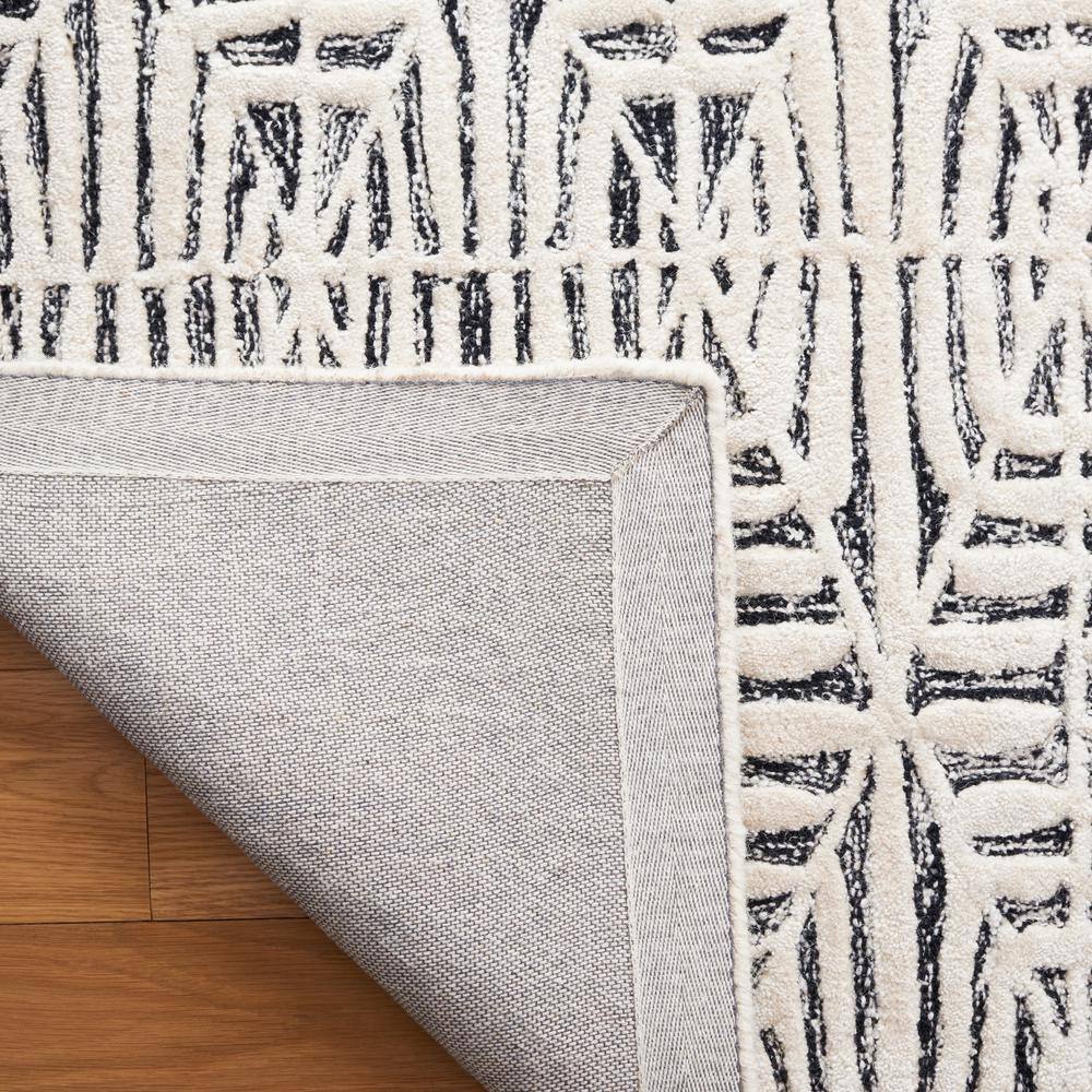 Black and Ivory Tufted Wool 8' x 10' Area Rug