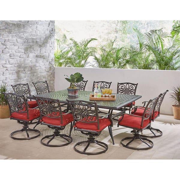 Traditions 11-Piece Aluminum Outdoor Dining Set with 10 Swivel Rockers and Red Cushions