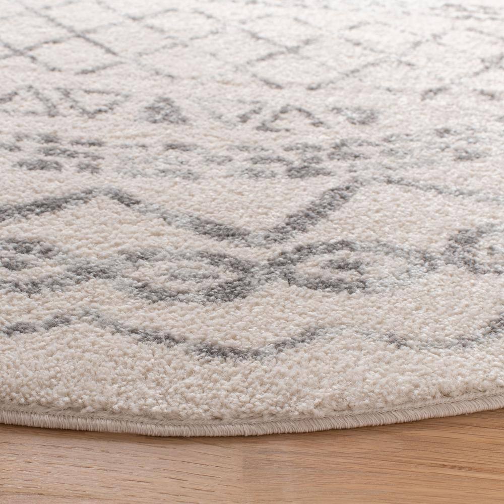 Ivory and Grey Round Synthetic Easy Care Area Rug, 9' x 9'