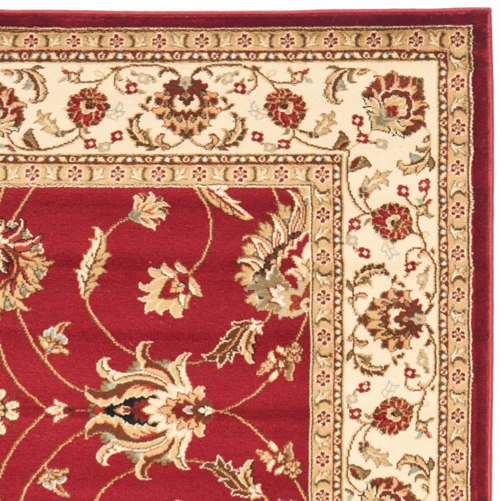 Red and Ivory 4' x 6' Synthetic Safavid Style Area Rug