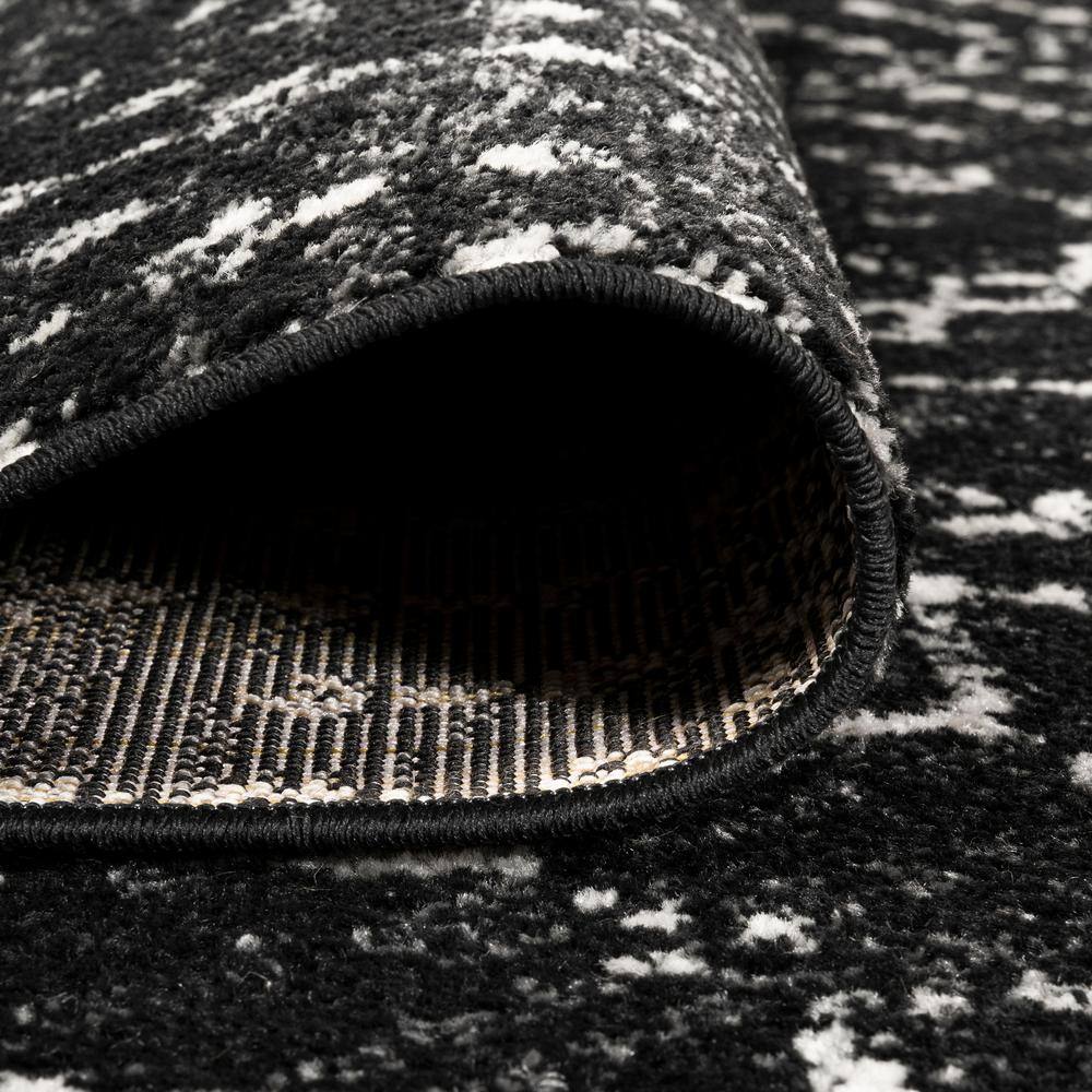 Black and Ivory Diamond Reversible Synthetic Area Rug
