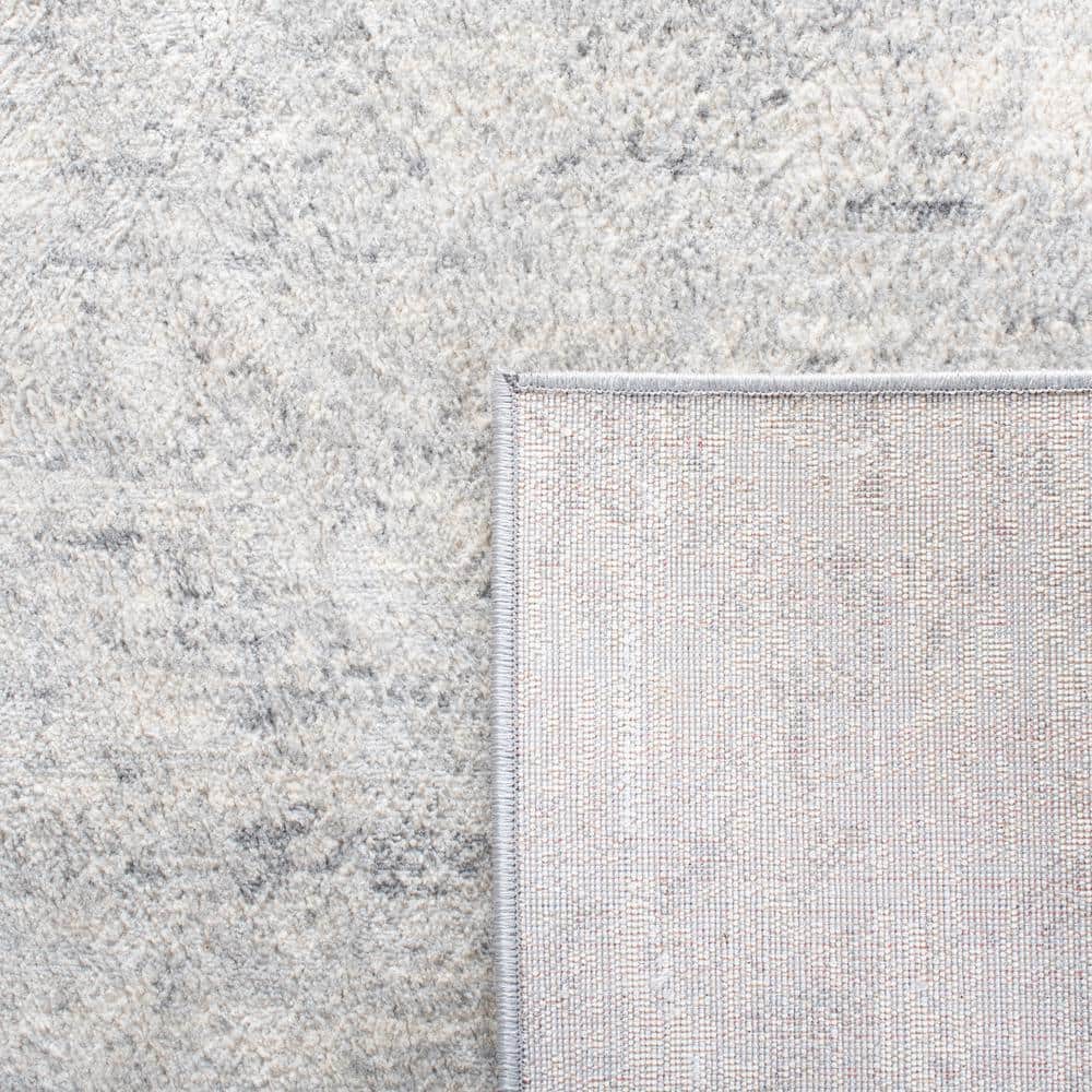 Brentwood Ivory and Gray 8' x 10' Synthetic Rectangular Area Rug