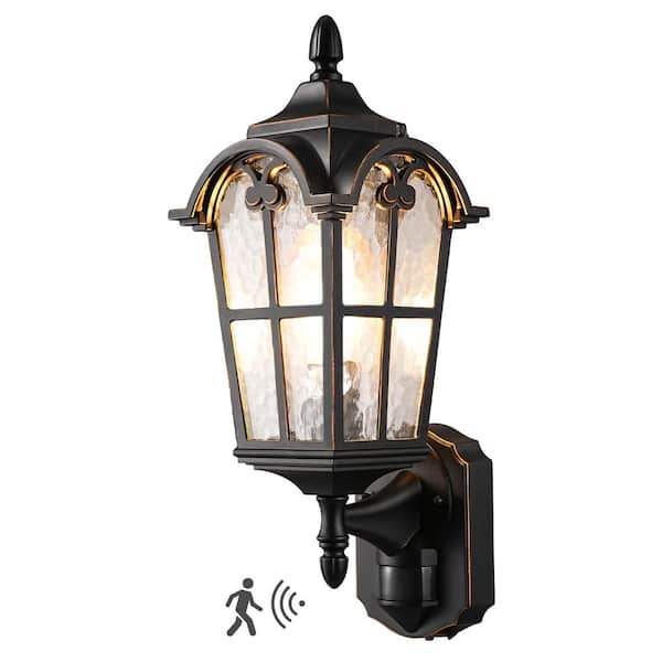 EDISHINE 17.83 in. Black with Gold Edge Motion Sensing Dusk to Dawn Outdoor Hardwired Wall Lantern Scone with Water Ripple Glass