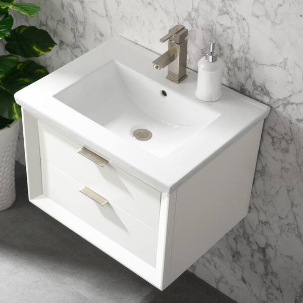 https://images.thdstatic.com/productImages/5b231fa9-8ce7-49bf-8d02-e592d231c8a4/svn/urban-furnishing-bathroom-vanities-with-tops-sp-danbury-24w-fa_600.jpg