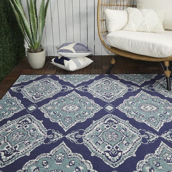 https://images.thdstatic.com/productImages/5b3350eb-7f74-4ff6-863d-eb54fe8b8bf1/svn/navy-balta-outdoor-rugs-3003245-e1_600.jpg