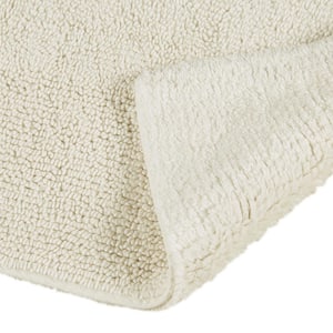 Plume Ivory 21 in. x 34 in. Feather Touch Reversible Bath Rug