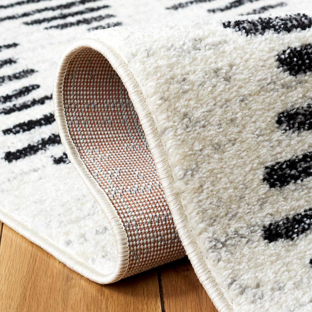 Reversible Black Synthetic 8' x 10' Easy-Care Area Rug